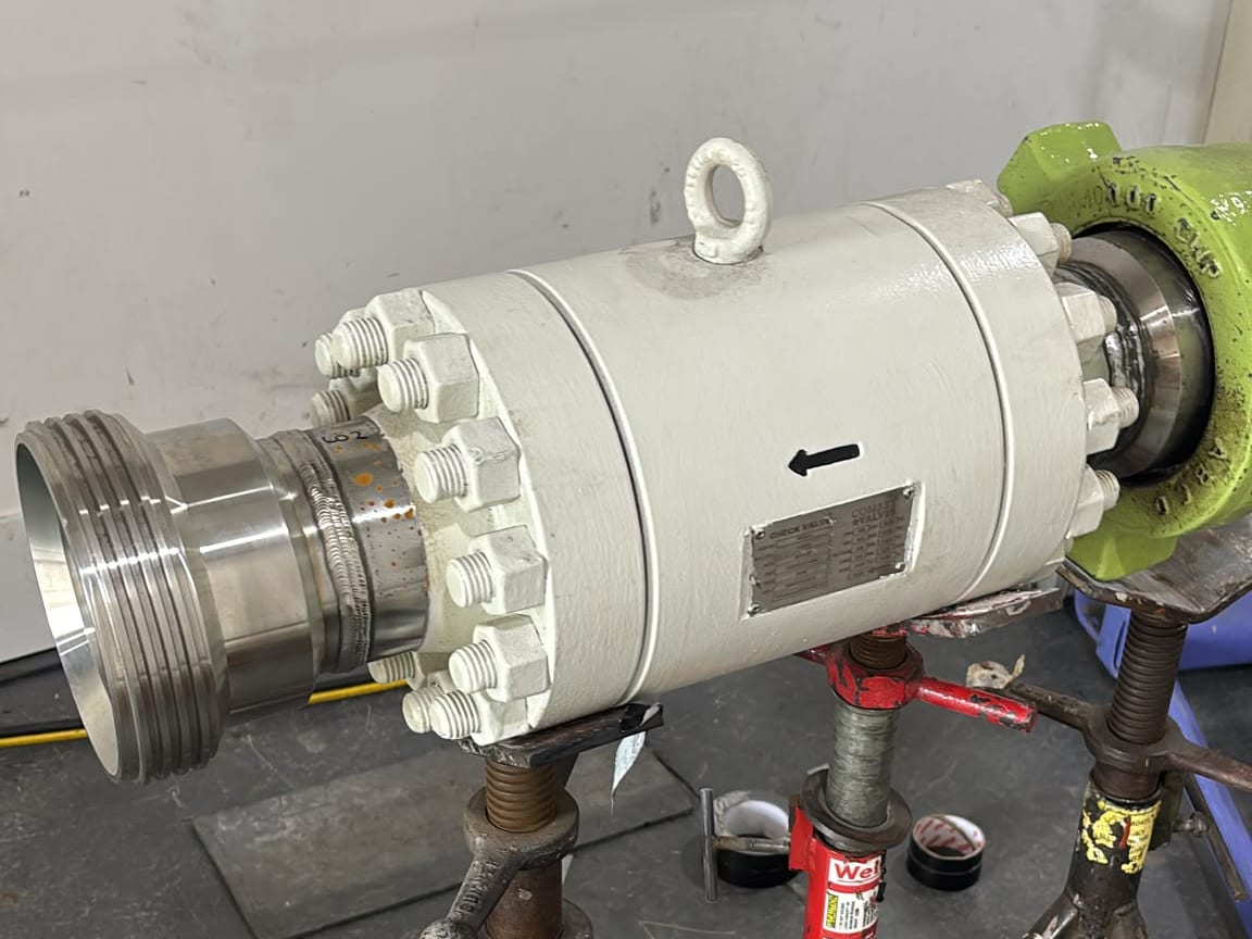 One of the eight check valves on pipe stands ahead of radiography of its butt welds