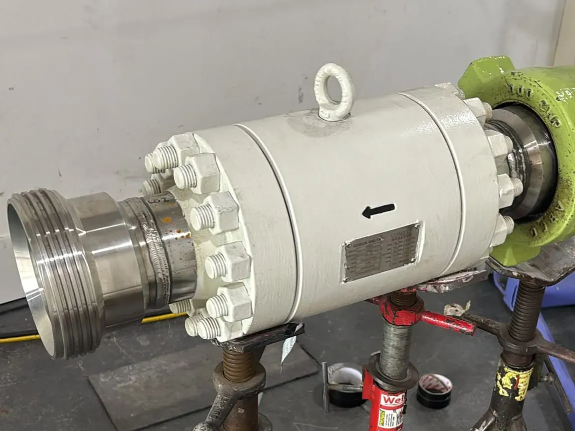 One of the eight check valves on pipe stands ahead of radiography of its butt welds