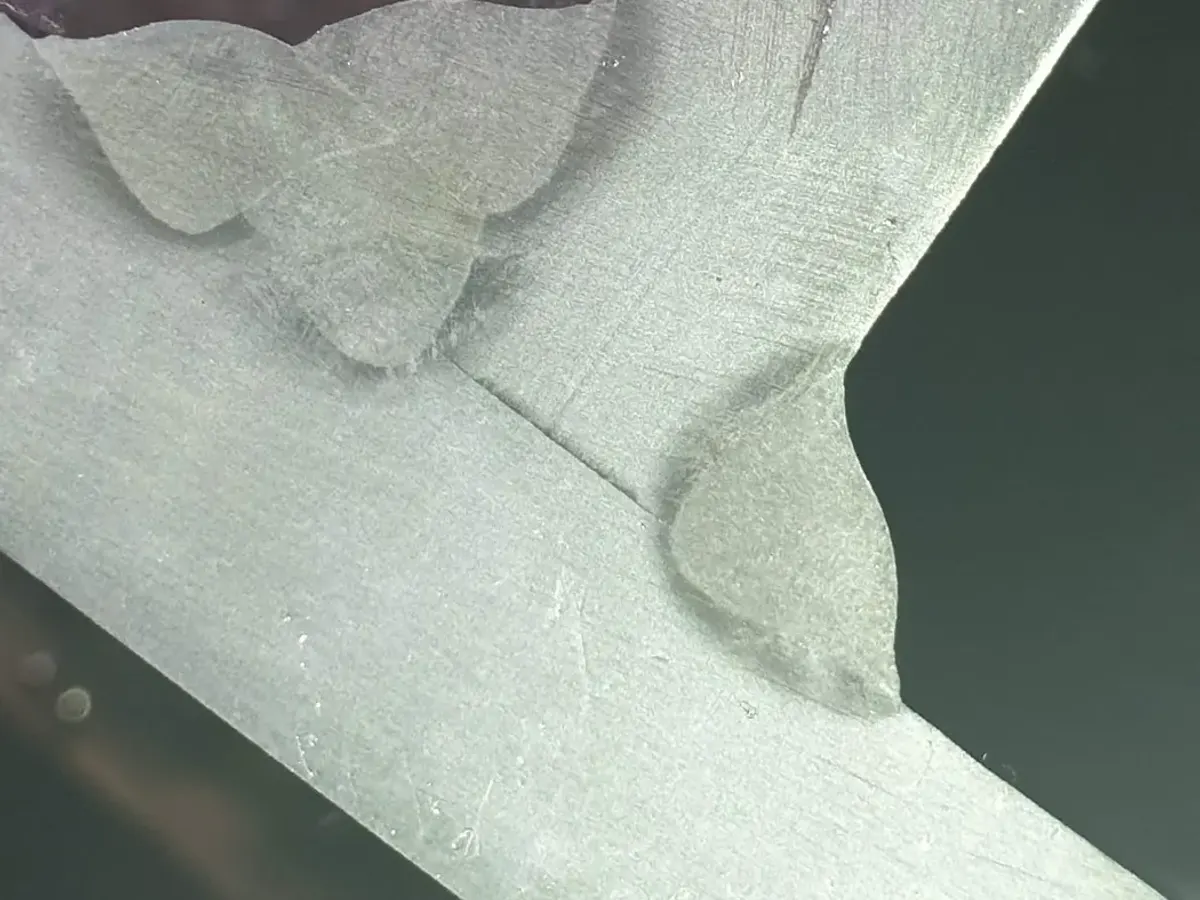 Etched macro section through a fillet-welded T-joint