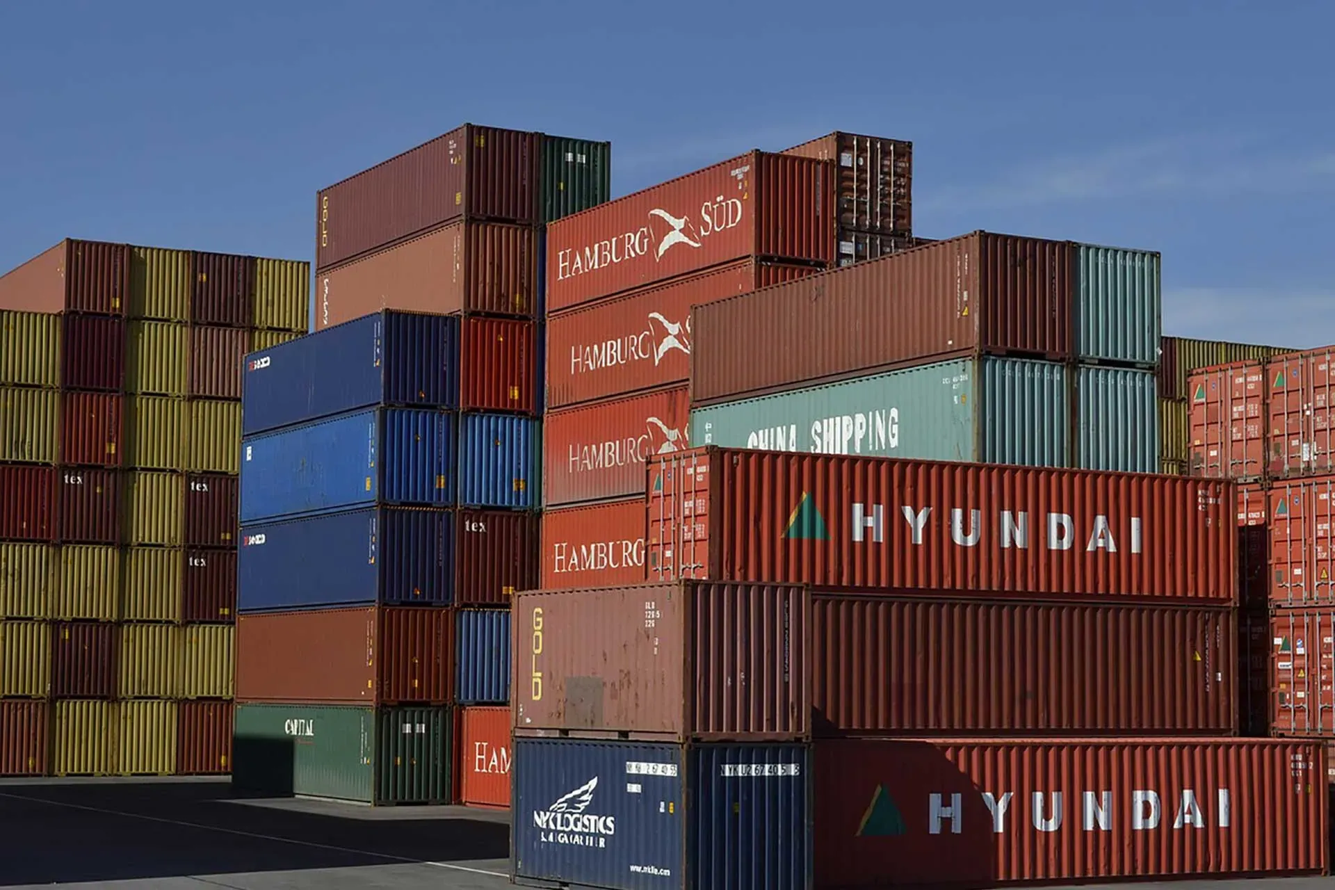 Shipping containers being surveyed to IICL inspection standards